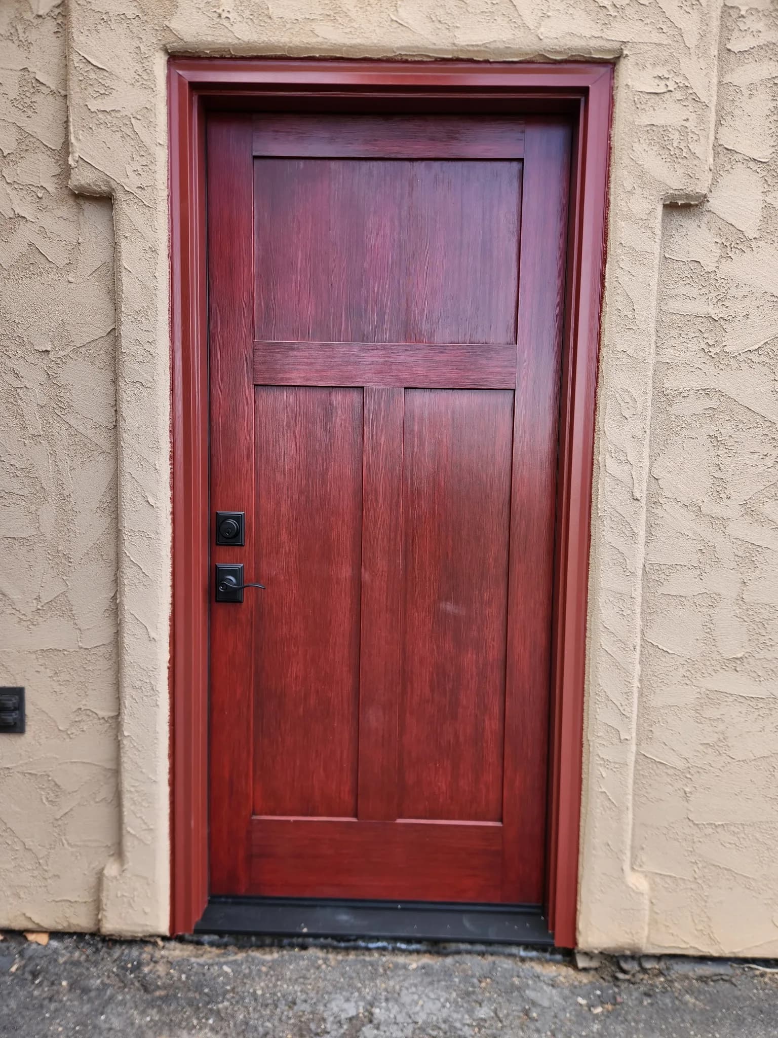 Exterior front entry door on a stucco home, Montrose Colorado