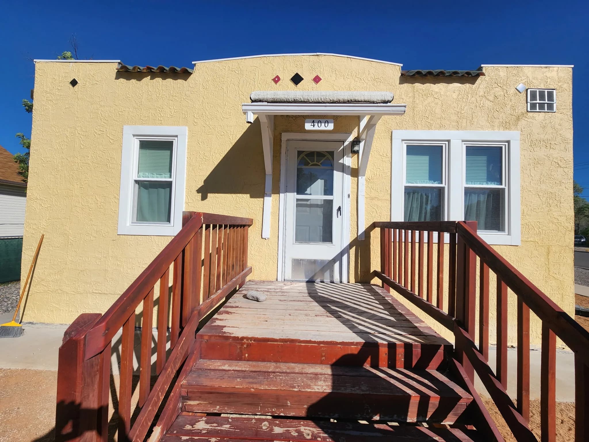 Southwestern stucco home with new energy efficient windows